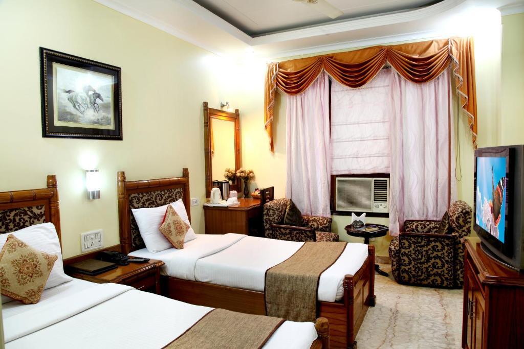 Hotel Tjs Grand Delhi Szoba fotó